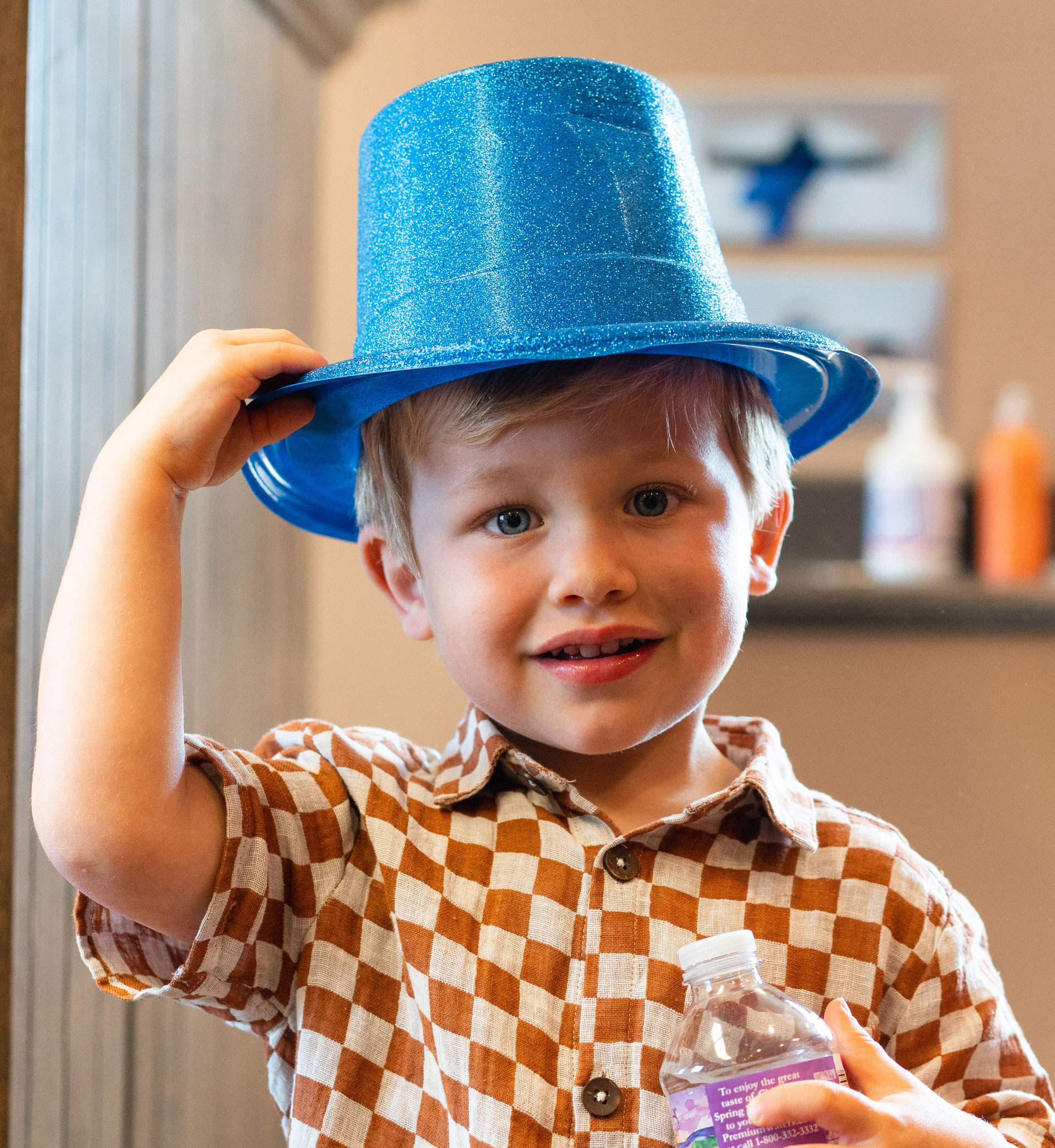 young patient in blue hat